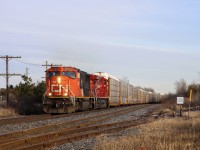 2021.12.14 CN 5611 leading CP 2T49-14, CP 8206 trailing. At North Siding Switch Bolton.