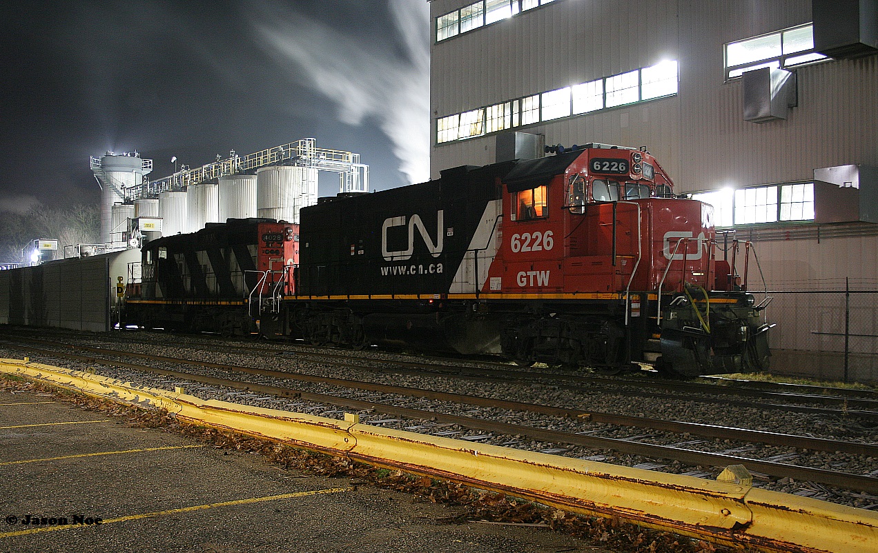 The crew of CN L566 has just changed ends and will begin working the Lanxess plant in Elmira, Ontario with GTW 6226 and CN 4028 before heading back to Kitchener later that night.