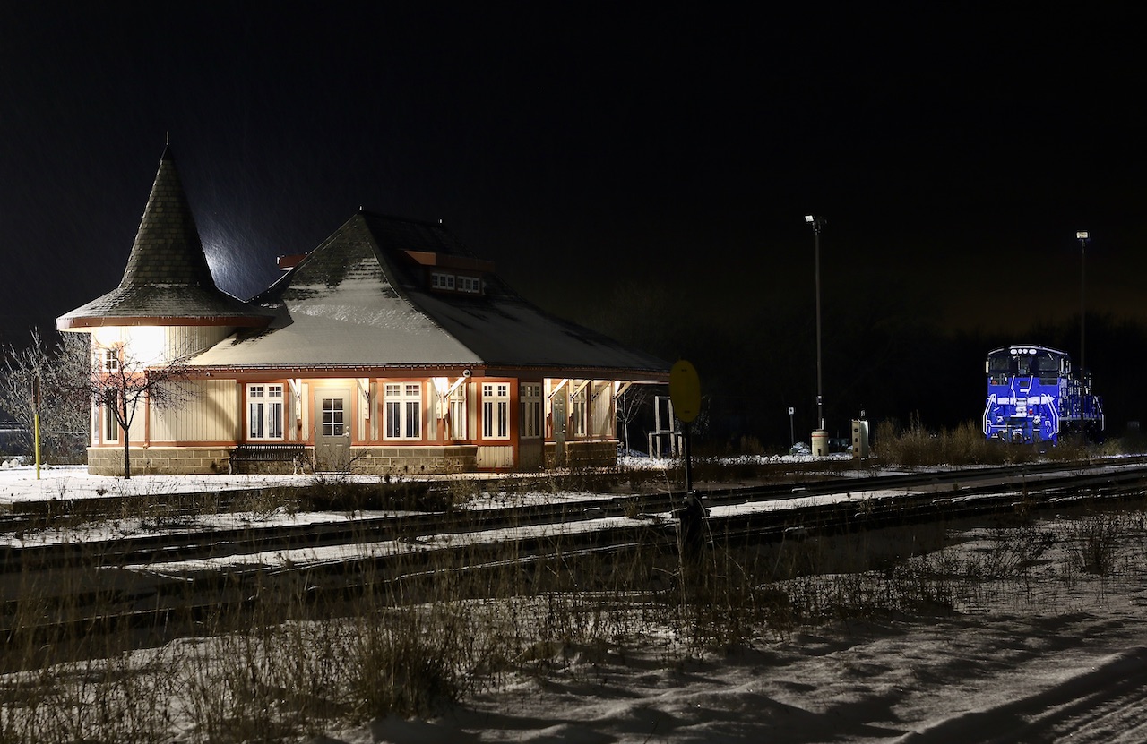 There is a bitter chill in the air as light snow falls. All is quiet other than a faint hum coming from 333, most likely the system that stops it from freezing up in these cold temperatures. While the station is nicely lit, the yard is depressingly empty and dead weeds cover many of the rails. Just out of sight to the right the Clorox factory is in the process of converting their old railway unloading area into a new truck transfer area. The sad reality that the railway is leaving and it most likely is for good, even the old rail spur to the factory has already been ripped out, and north of town the old railway right of way is being converted into a trail. The 333 most likely only has a week left of time here in Orangeville before the contract is over and this may be the last snowfall it sees here as well. For now December 17, 2021 seems to be the day for the last run to Streetsville one last time, let's hope not.