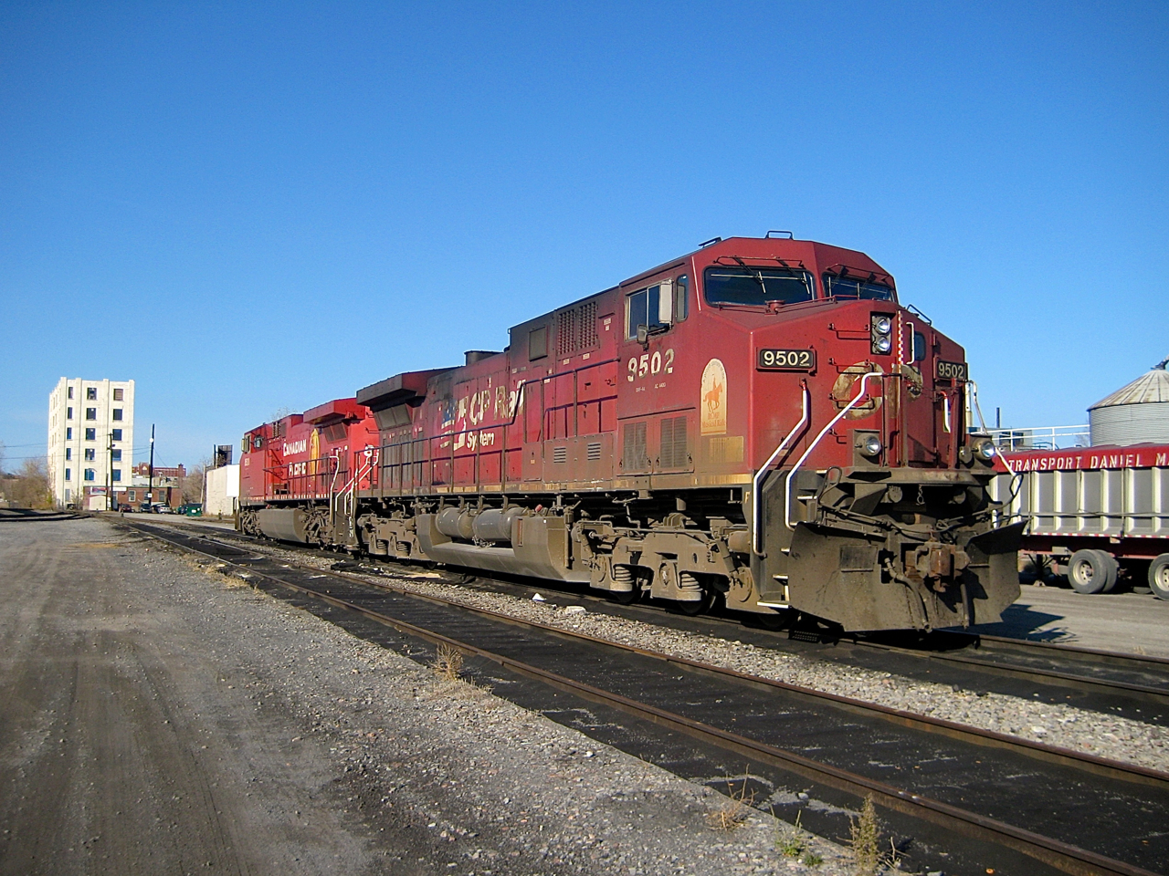 CP 9502 (along with CP 8520) lays over at the eastern end of Hochelaga Yard in 2007. It would be rebuilt into AC4400CWM CP 8001 in 2018. Above its builder plate, CP 9502 has a sticker noting that CP is a proud sponsor of the RCMP Musical Ride.