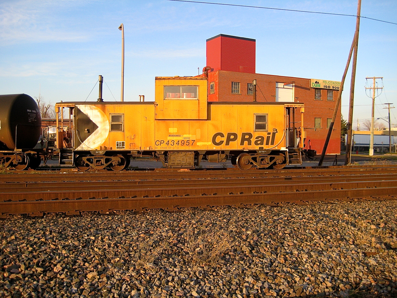 Spotless CP 434957 is on the tail end of the Dorion Turn as it switches at Dural. In the immediate foreground is the since removed CN/CP interchange track.