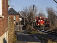 CP TH11 heads back south to Kinnear after working the CN interchange and Adams Yard. The GP38-2 trio seen here all have unique histories, the leader being ex MILW/SOO, the 7307 being ex LV/D&H, and the 3042 being original CP.