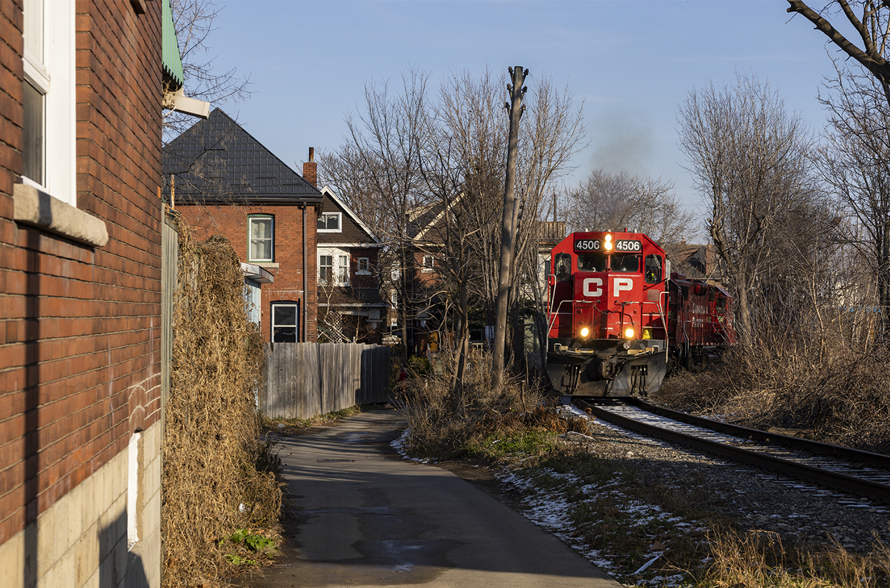 CP TH11 heads back south to Kinnear after working the CN interchange and Adams Yard. The GP38-2 trio seen here all have unique histories, the leader being ex MILW/SOO, the 7307 being ex LV/D&H, and the 3042 being original CP.