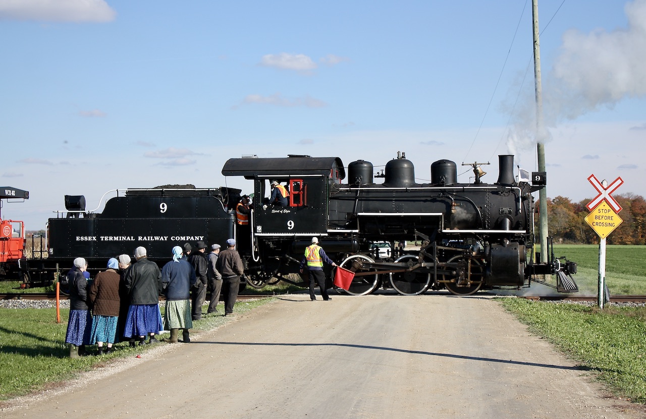 It has been a long time since I have crossed paths with ETR steam engine 9, too long if you ask me. For a few years it seemed I was chasing it all around southern Ontario. An autumn trip up to St. Jacob's would net a scene I wanted to catch for a while in Amish country, as a group of Amish residents gathered at a crossing to watch the passage of #9. It to me creates a scene that looks like an image taken generations ago. My trips to Amish areas in Pennsylvania and Ohio years ago have netted similar images. Funny even plane spotting at Buffalo airport a few years ago created a similar image. The Waterloo Central is definitely a tourist railroad worth a visit, and today they have even more unique units than years ago.