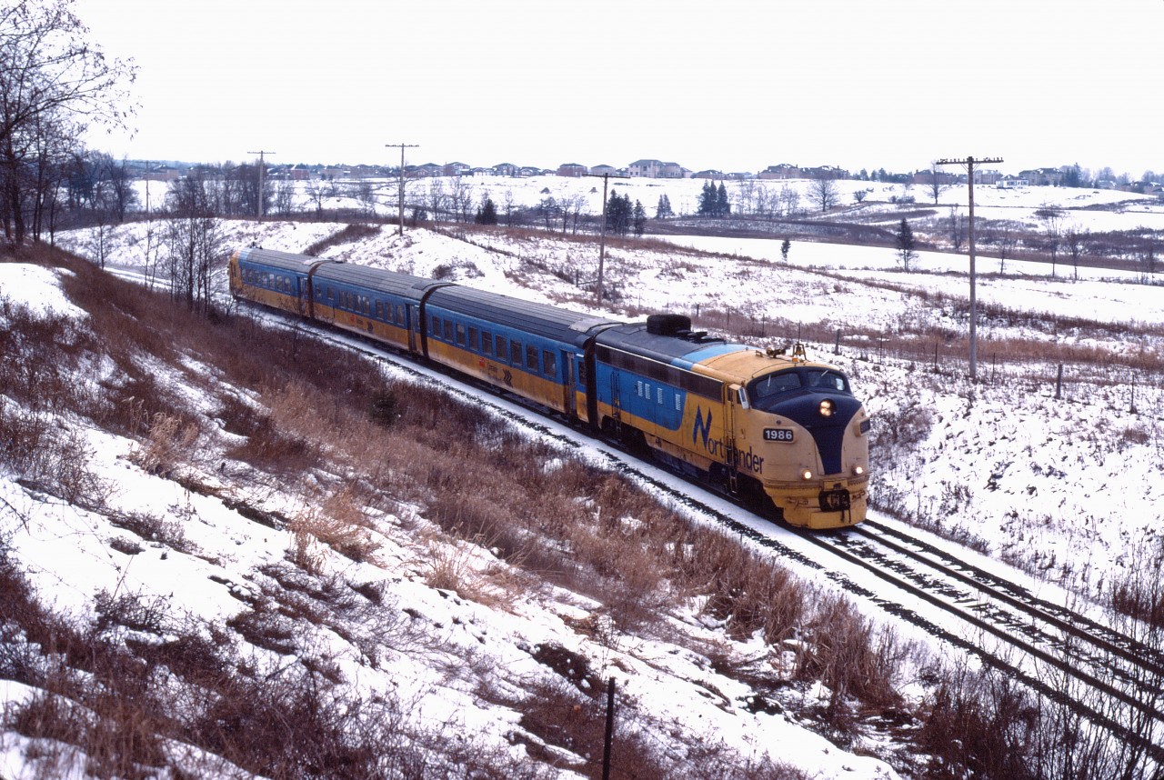 Thirty years ago, the Boxing Day edition of Ontario Northland train No. 121 rolls through King City on its way from Toronto to Cochrane. This was the last winter for this routing...If I recall correctly, by February 1992 the TEE equipment had been replaced by rebuilt GO Transit cars and the train moved to the Bala sub. VIA continued to operate its tri-weekly Canadian through here until September 1996; Metrolinx bought its portion of the Newmarket sub in December 2009 (including through King City).