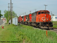With all kinds of attention on the OBRY, back in 2005 I wanted to shoot them and decided to go to the diamond with <a href=railfan.ca target=_blank>David Graham</a> in Brampton and just wait for it. There would be CN trains - and good ones too, there always was. You didn't have to wait long - there were twice the trains and half of them had something good leading. After a flurry of <a href=http://www.railpictures.ca/?attachment_id=1363 target=_blank>CN and</a> GEXR freights, <a href=http://www.railpictures.ca/?attachment_id=32523 target=_blank>the OBRY appeared</a> and I chased them to Streetsville and back. The above is one of the other CN freights we saw and one of the better pictures I got that day. It was just another freight at the time, and nothing special (nothing was foreign on this train) but now it's definitely a good one.