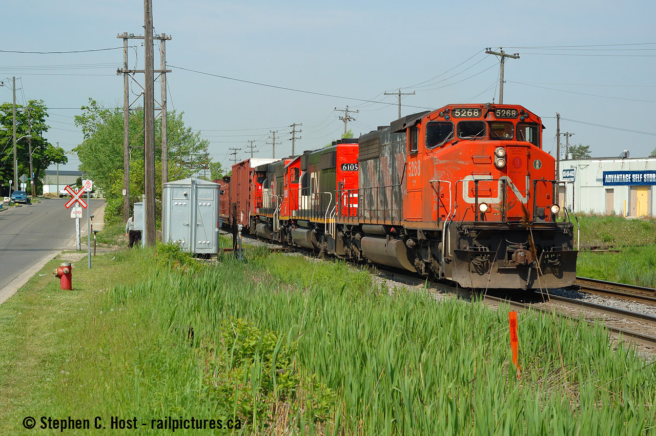 With all kinds of attention on the OBRY, back in 2005 I wanted to shoot them and decided to go to the diamond in Brampton and just wait for it. There would be CN trains - and good ones too, there always was. You didn't have to wait long - there were twice the trains and half of them had something good leading. After a flurry of CN and GEXR freights, the OBRY appeared and I chased them to Streetsville and back. The above is one of the other CN freights we saw and one of the better pictures I got that day. It was just another freight at the time, and nothing special (nothing was foreign on this train) but now it's definitely a good one.