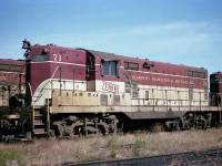 The first locomotive to come out of the new GM diesel plant in London Ontario back in 1950 was TH&B 71. It was destroyed in a grade crossing accident in Pelham Ontario in February of 1980.
The unit is shown between assignments in the Chatham St TH&B yard in Hamilton on a sunny afternoon back in late 1978.
