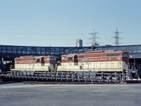 Sometimes you find a gem online...Here we have TH&B GP9s 402 and 403 riding the turntable at the CPR John Street roundhouse in Toronto in the summer of 1958. I'm a little puzzled about this one--my understanding is that run-through power on the Toronto-Buffalo trains ceased after the TH&B and NYC dieselized in 1954 but CP continued to use steam between Toronto and Hamilton. However, this photo and others show that TH&B power at least handled passenger trains over the Oakville sub. Any insights out there? (Thanks to Steve Host for his help cleaning this one up.)
