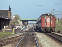 When you look at a scene like this you have to wonder how VIA (and the government) managed to kill the country's passenger business. In this image, people have de-trained the Niagara-bound Budds while the Amtrak #98 slows in the distance until all is clear before making its' station stop.
In 2021, Amtrak is canceled due to covid; the two each way Budds gave way to VIA trainsets; in 1990 that got chopped....VIA service reinstated; then chopped...........the scene is repeated all over the country. When I lived in St. Catharines, my sidekick back in the day enjoyed visiting her parents up in Unionville by taking the train.......it was easy. Now? Good luck trying THAT !!! It is a lonely place around St. Catharines station these days.