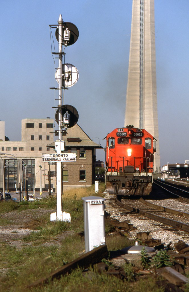 Peter Jobe photographed CN 5502 with train #392 heading east at Jarvis Street in Toronto on September 6, 1980.