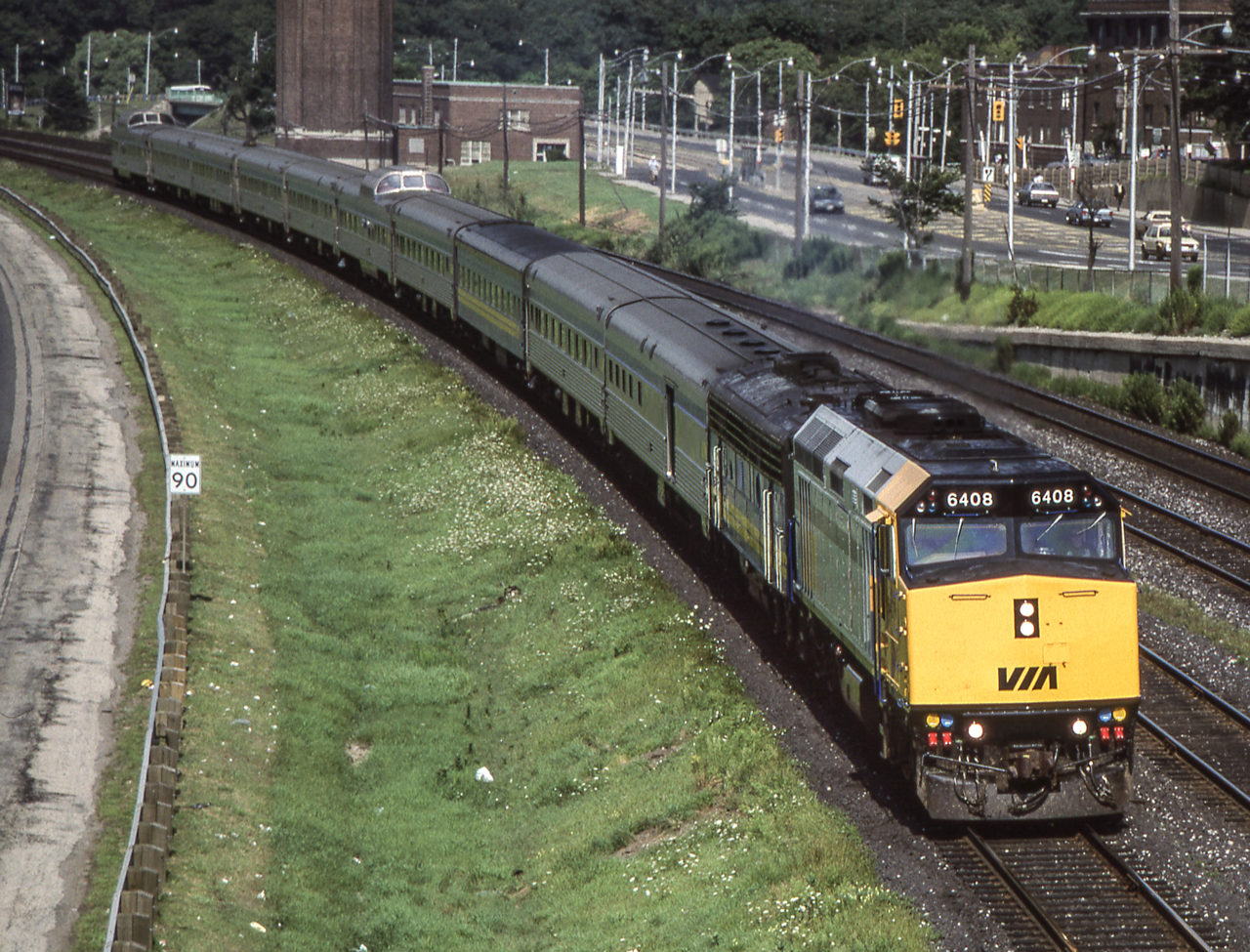 VIA 6408 is eastbound in Toronto in August 1987.