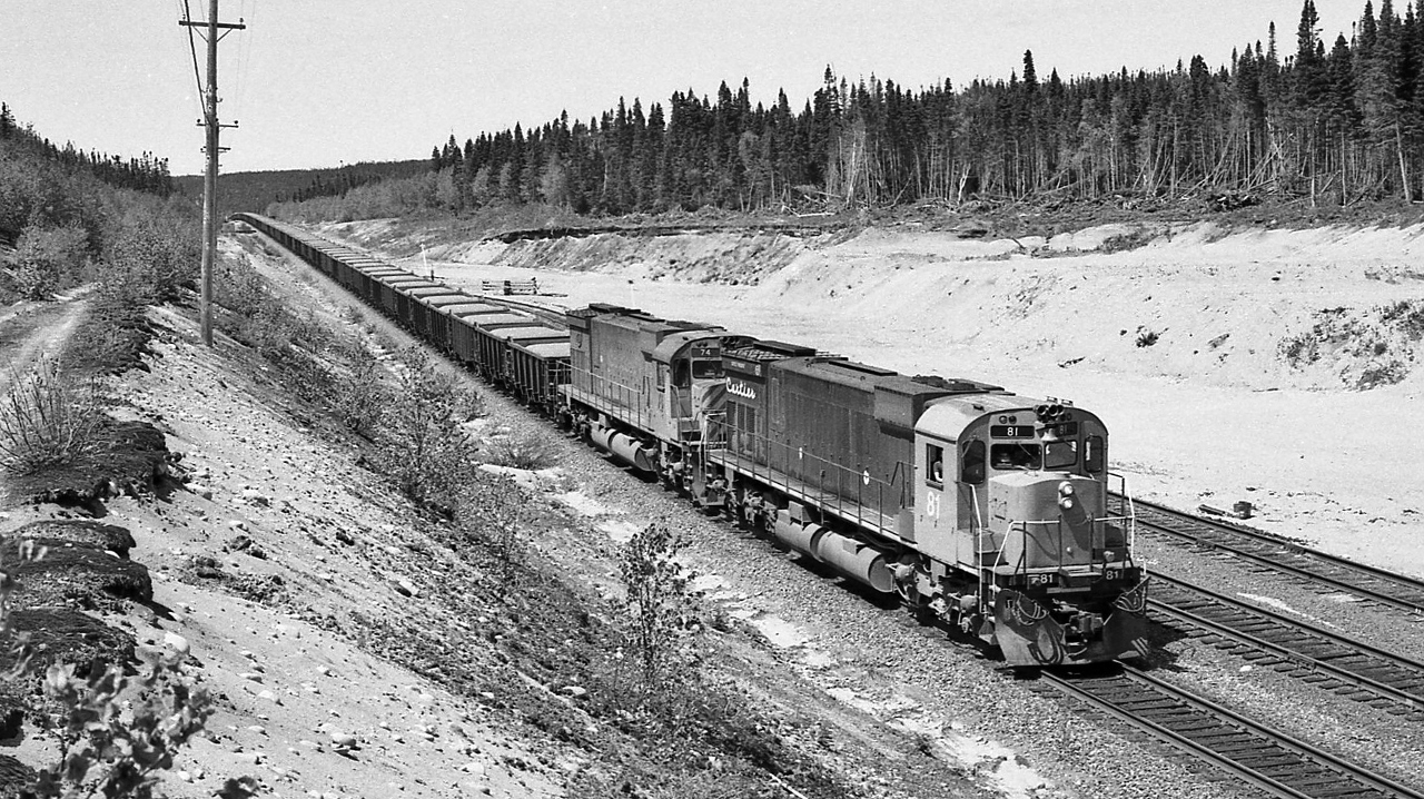 Heavy Haul Haven


   Alco-philes Utopia


   Cartier Railway 81 and 74  on a southbound ore pellet train at Able, the first siding north of Port Cartier. 


   At Able, P.Q., June 7, 1981 Kodak negative by S.Danko


   notable:


   Cartier 81: a 1975 built MLW M-636, scrapped 2003


   Cartier 74: a 1973 built MLW M-636, sold in 2002 to Marine Diesel Engines


   Cartier Railway (now Arcelor Mittal Mines Canada) first generation  MLW's, Alco's, and GMD's out of service or sold by 2000 and or scrapped by 2011


   The six axle Alco's MLW's retired by 2002, some sold, some scrapped, several to WNYP (and since retired).


   Arcelor motive power is now nineteen GE AC4400CW, five SD70's, two SD90's and some leased GE's. ( credit  Trackside Guide)


   sdfourty