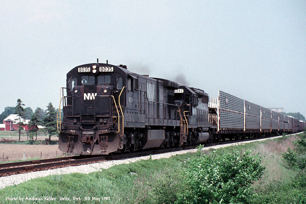 A Pair of Norfolk & Western engines (C30-7 8035, and SD40-2 6092) passing through Delhi, ON on their way to Detroit. Map location is an approximate guess