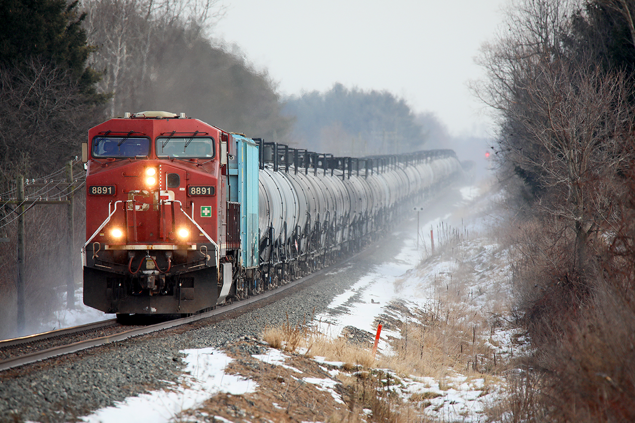 As close as you can get to perfect symmetry....even a nose of GE on the rear(coal stained 8881). Empty ethanol tanks sprint west for a refill in light flurries. If only there had been more to stir up. :)