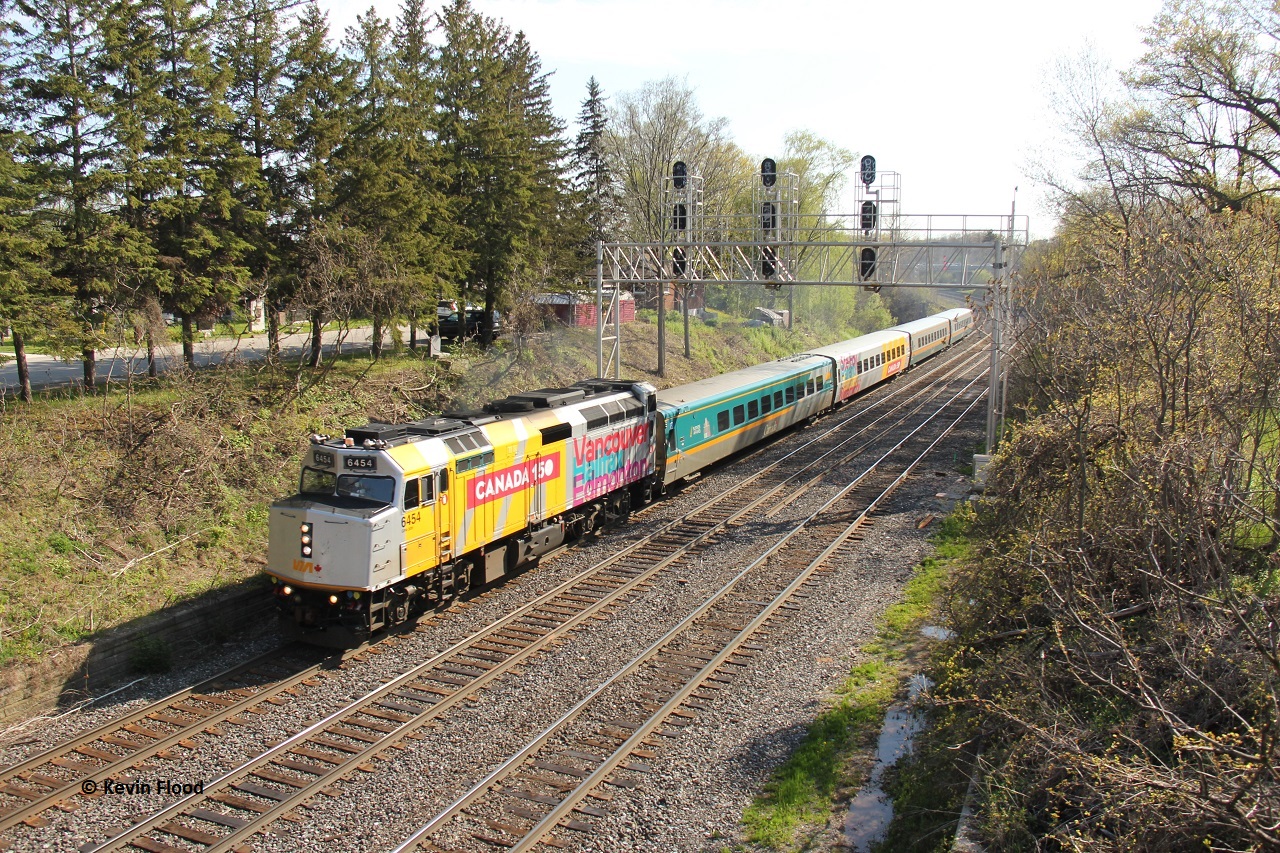 Eastbound VIA #76 approaches Aldershot station on a fine spring afternoon in 2017. 2017 marked the year VIA first introduced these silver-wrapped locomotives, first in commemoration of Canada 150, then to celebrate VIA's 40th Anniversary in 2019.