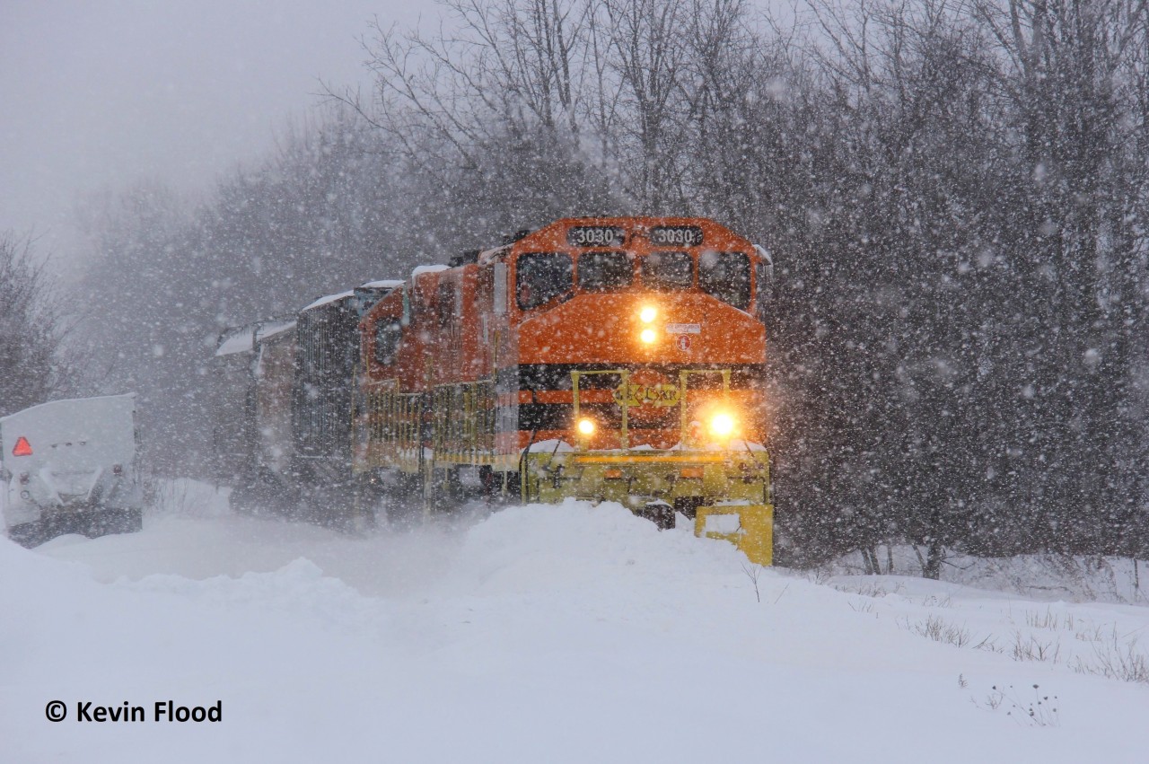 Departing Exeter in the midst of a heavy snowsquall, GEXR 3030 is plowing snow as it slowly makes its way to Clinton and then eventually Stratford. It will work Hensall on the way. Thanks to Mr. Host who provided the transportation, I was able to snag many interesting shots of this train that day as it trundled through snowy landscapes and snowsqualls. Wearing snow pants was a must that day.