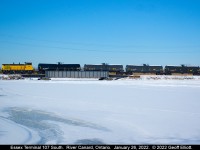 A little further south on the Essex Terminal and we have #107, with it's 4 tanks in tow, rolling over the River Canard bridge.  Best part of this time of year is with the river frozen over you can walk out and get closer pics than you can from land the rest of the year.  May have hit this spot again this year before the Spring thaw.