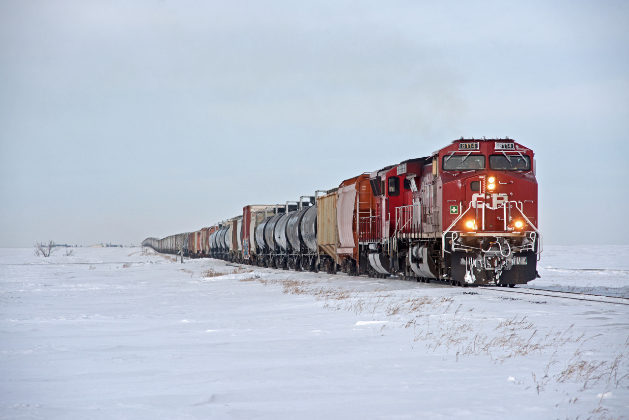 Wynyard-Moose Jaw train N08 rolls through a stark winter scene at Albatross Saskatchewan on CP's Lanigan Subdivision.