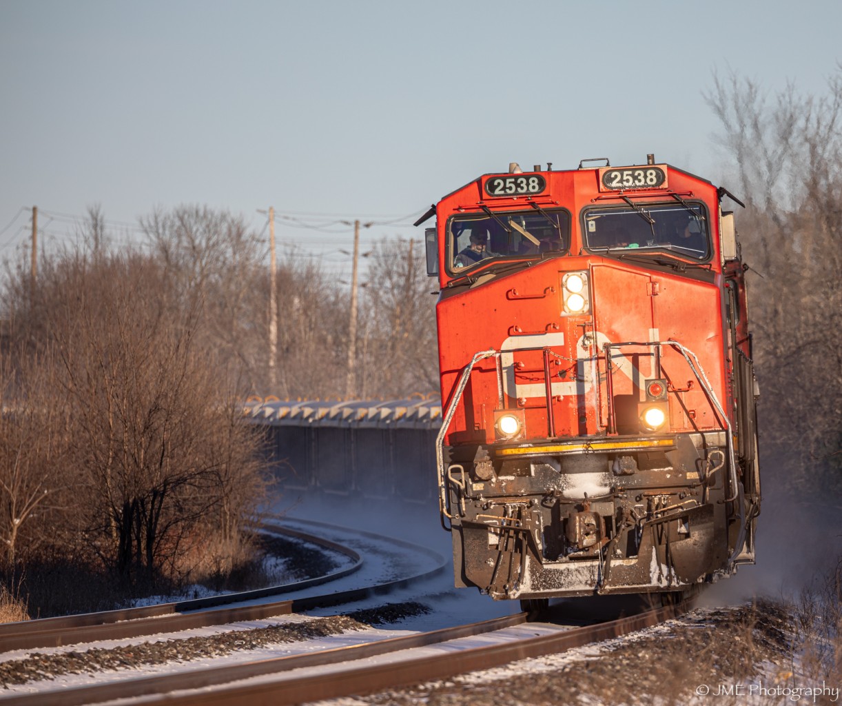 CN M305 rounds the curve at MP 169 of CN’s Kingston Sub, with my buddy Engineer Rob at the controls, and two other conductors including a trainee from Toronto, on board this mixed freight originating from Moncton.