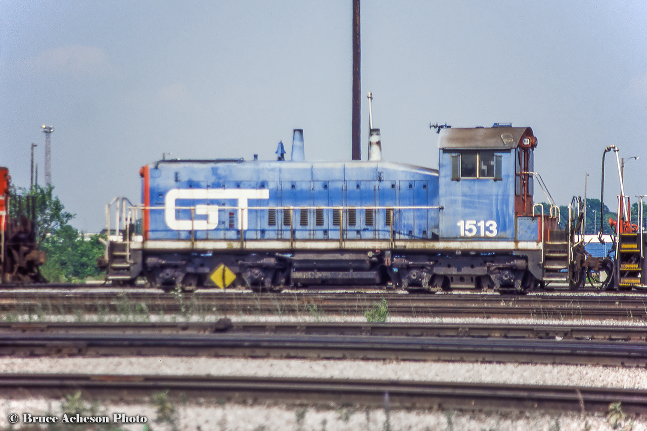 GTW SW1200 1513 is seen at Mac Yard.  Built in March 1960, the unit would be sold to Canac in 1997, as CANX 1513, later rebuilt in 2013 to Burlington Junction Railway road slug 1513B.