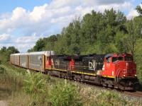 Back in the days before GE seemed to rule CN’s roster. CN original group of Dash-9’s was high on my list of units to catch in the lead. Today they still are. There is something about their unique cabs that made them likeable, not to mention them being the only Post Dash-8’s to carry the CN North America paint. Leader 2517 is also unique as it wears a modified version of this paint complete with the CN website. Here sisters 2517 and 2511 lead train 275 past the sweeping curve at mile 30.