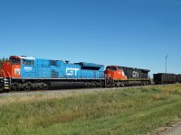 SD70M-2 CN 8952 in heritage GT livery and DASH 9-44CW CN 2666 have just set of a line of coal card in CN's Scotford Yard.