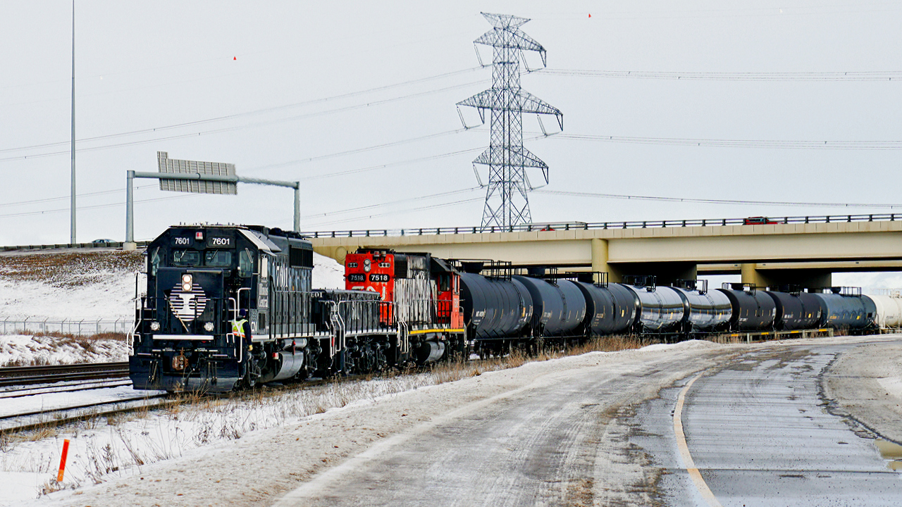 On a dull wintery day GP40-3 CN 7601 and HBU-4m #601 both in IC heritage livery assisted by GP38-2 CN 7518 are switching in Clover Bar Yard.