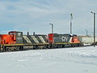 GMD-1u CN 1438 and GP38-2 CN 7514 are on switching duties in CN's Clover Bar Yard.