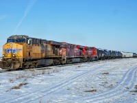 CP,s local from Scotford to Edmonton is headed by AC45CCTE UP 5489 as it makes its way west on the Scotford Sub.