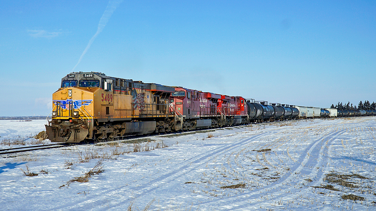 CP,s local from Scotford to Edmonton is headed by AC45CCTE UP 5489 as it makes its way west on the Scotford Sub.