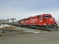 GP 38-2 CP 4444 (ex SOO) and CP 3039 are switching cars into the Lafarge Plant at Clover Bar in north east Edmonton.