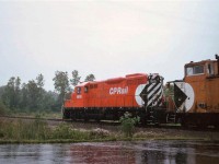 1615 and van 434017 is heading east towards Brookfield on the former CASO, having just crossed Netherby-Townline Road.  The pair were on switching assignment at the former WELLAND TUBES (STELCO) facility that is sandwiched between Ridge Road and the Welland Canal (Welland Bypass). They were likely returning to the TH&B/CPR/CONRAIL Welland Yard.  WELLAND TUBES produced a significant portion of the large diameter pipe used for the Trans Canada pipeline(s), and had a sister plant in Camrose Alberta which is now run by the Russian steelmaker EVRAZ. The rail line here has long since been removed, which would have included an interlocked diamond with the CN Stamford Sub at the bottom end of CN's Southern Yard.  Van 434017 does not appear easy to find on CPR Caboose/Van lists, with most of that series starting with 434018, but clearly it existed. Thanks to Steve H for help cleaning the image up.