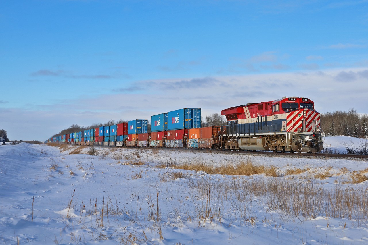 Z 11251 17 highballs through Deville, Alberta on a chilly winter afternoon.