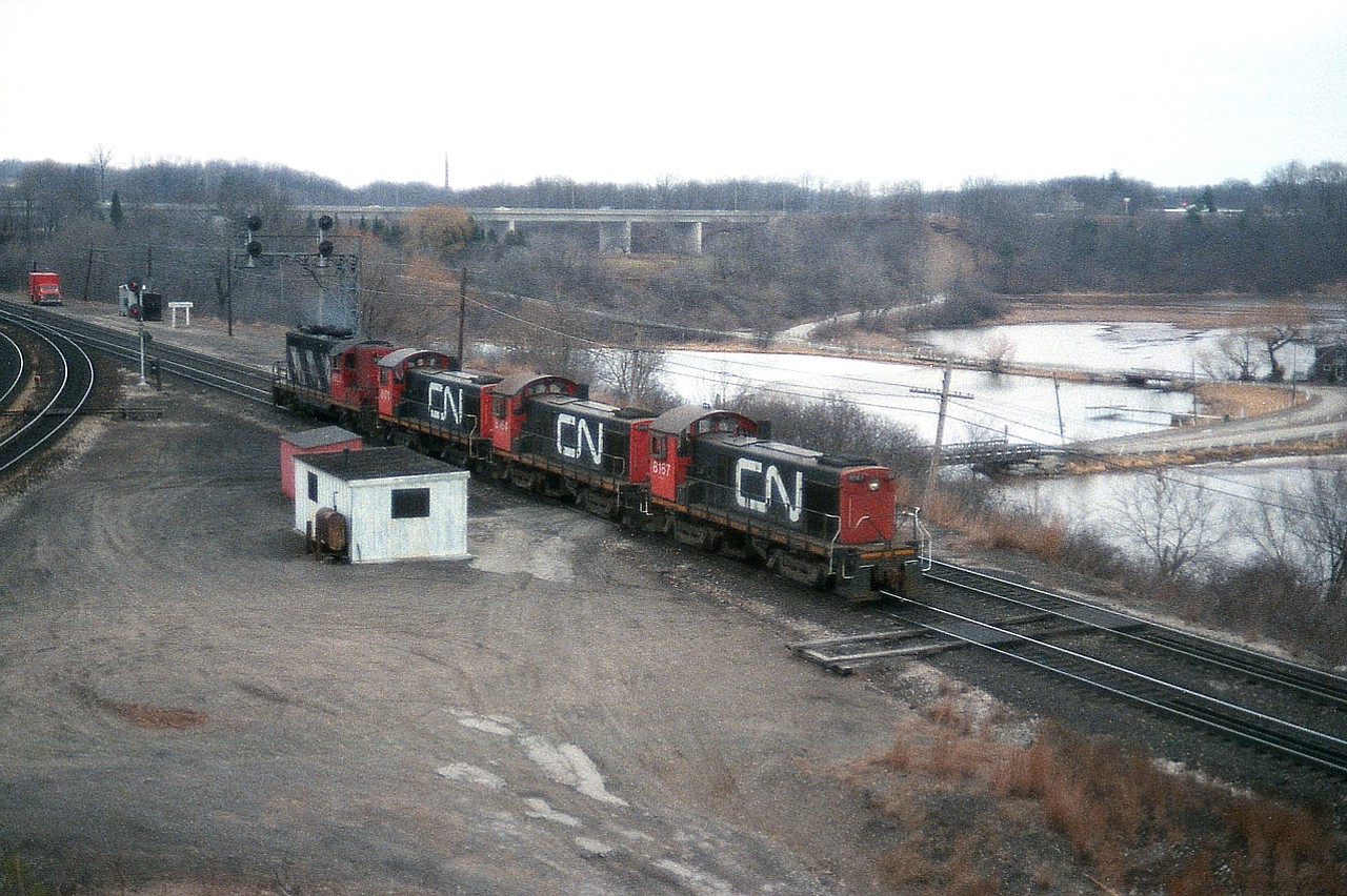 I thought this an odd sight.  CN 4523 with CN MLW S-4 switchers (S-7?) 8171, 8164 and 8167 heading eastward thru Bayview one morning.   The series 8163-8195 were being retired 'en masse' around this time, and it got me wondering if these three units were on their "last run"...and heading to Mac Yard.  I recall many of them working Hamilton yard at one time but slowly being replaced.