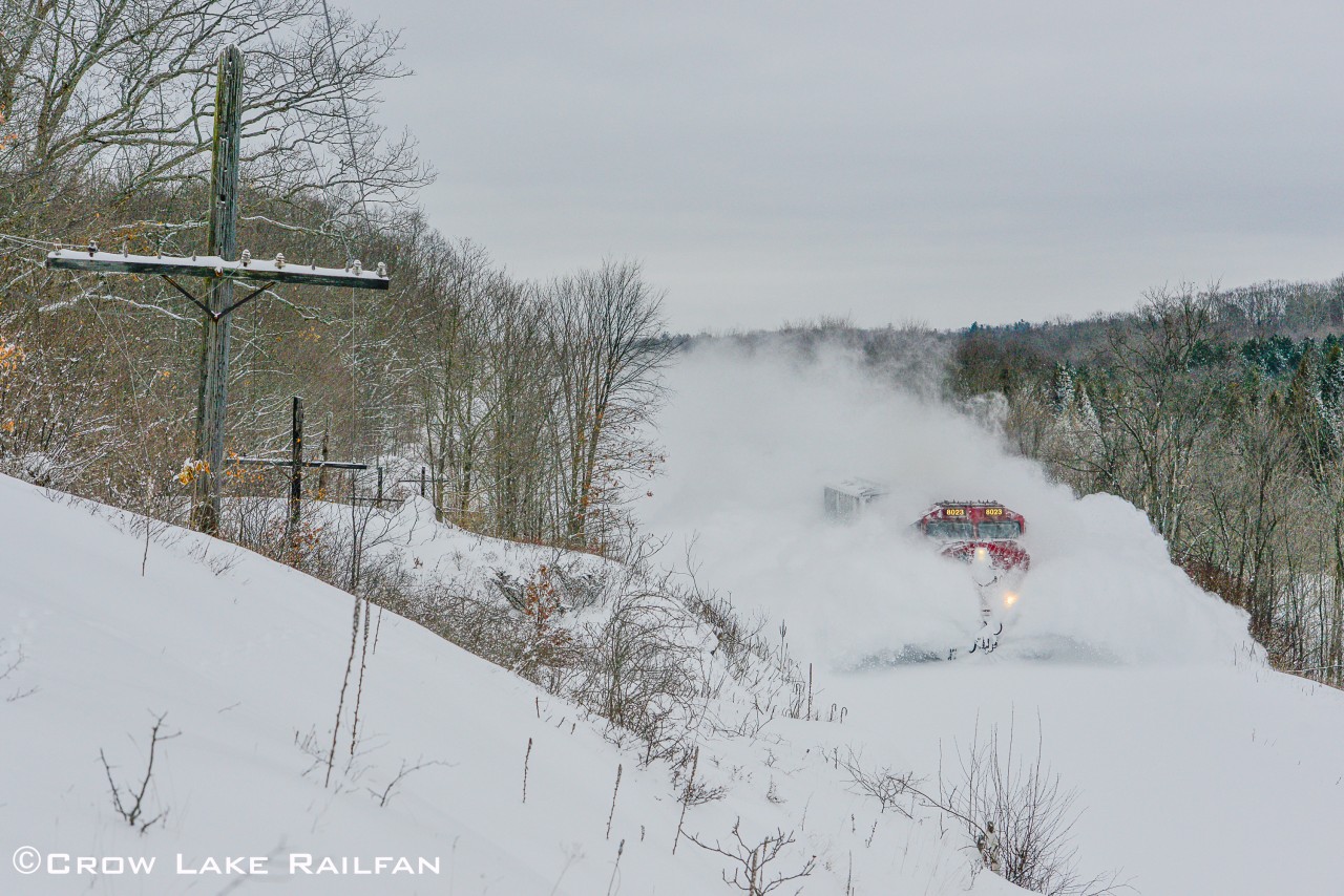 CP 651 was the first train to blast through the foot of snow on the Belleville sub this afternoon. Definitely a spectacle to watch it pass. Here it is passing MP34.
Our laneway wasn't plowed at the time so I had to hike about 5km to get to the tracks. I'd say it was worth it