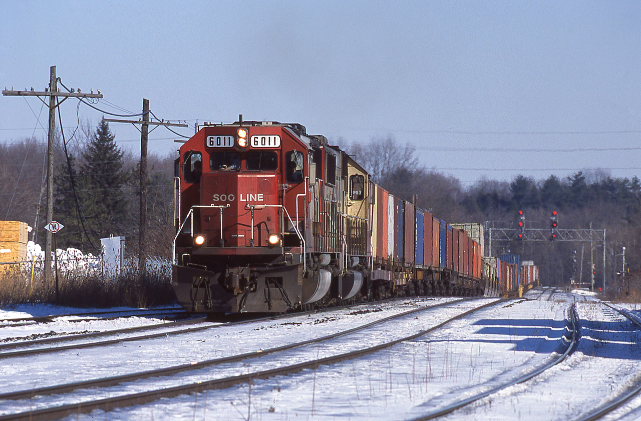 Here is one of those daily sights (at the time) that has aged quite well in my opinion.  CP 159 is seen topping the escarpment at Guelph Junction with the standard pair of SOO SD60s.  SOO Line SD60s were a daily, often multiple times a day sight on the Galt Sub for years if not decades.  Personally I never got bored of them, but at the same time never got overly excited either.  Today I'd be chasing this thing till I ran out of light, but at the time it was just another one and done train, maybe the next one will have something even better.