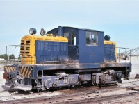 While roaming around on June 5th, 1977, I found this little beast at the Consolidated Sand & Gravel facility on CN's Uxbridge Sub near Millikens, Ontario.  I could not find any evidence of a unit number or builder's plate, but research indicates it was built in 1950 by Canadian Locomotive Company in conjunction with Whitcomb.  