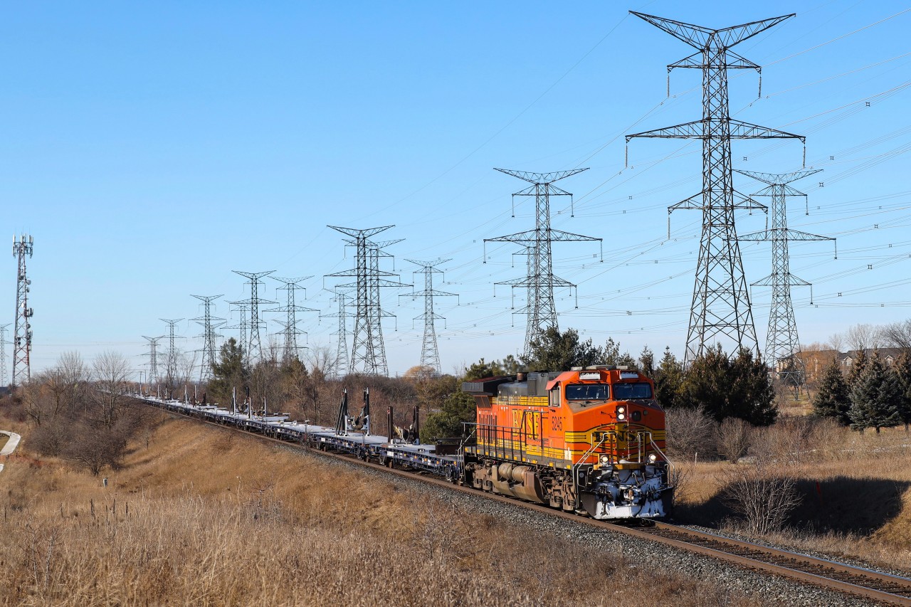 2022.01.16 BNSF 5245 leading CN X388, at Mile 10 York Sub.