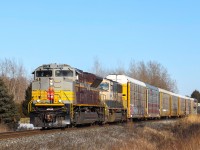 2022.01.15 CP 7019 leading CP 235-15, BNSF 9572 trailing, crossing the Melrose Diamond on Windsor Sub.