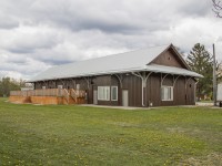 In response to Arnold's <a href=http://www.railpictures.ca/?attachment_id=47633>recent posting of Listowel</a> in 1976, here is the former Wellington, Grey & Bruce/Great Western/Grand Trunk/Canadian National Railway station in Listowel, today in use by the Kinsmen Club and known by the locals as "Kin Station".  It was originally constructed in 1871 in the WG&B Kincardine Branch, with service beginning in December 1872.  In recent years it has received a metal roof, new deck, wheel chair accessibility, and more.<br><br>Current interior photos available on the Kinsmen Club's <a href=https://www.listowelkinsmen.org/station-rental>Rent the Station</a> page.


