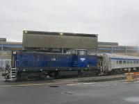 CAD's GMD-1 is about to shove coach VIA 8135 into the shops just after VIA 6426 arrived with two coaches.