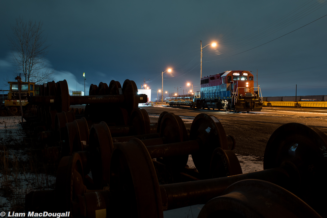 The first week of the G&W Oshawa switching ops is under way, and for the time being is about a 3-hour truck frame switching job under the cover of darkness. This is soon to change however, as a contract from CP for autoracks is in the works. Here we see a stopped RLK 4095 as the crew is just about to tie down the unit for the night.