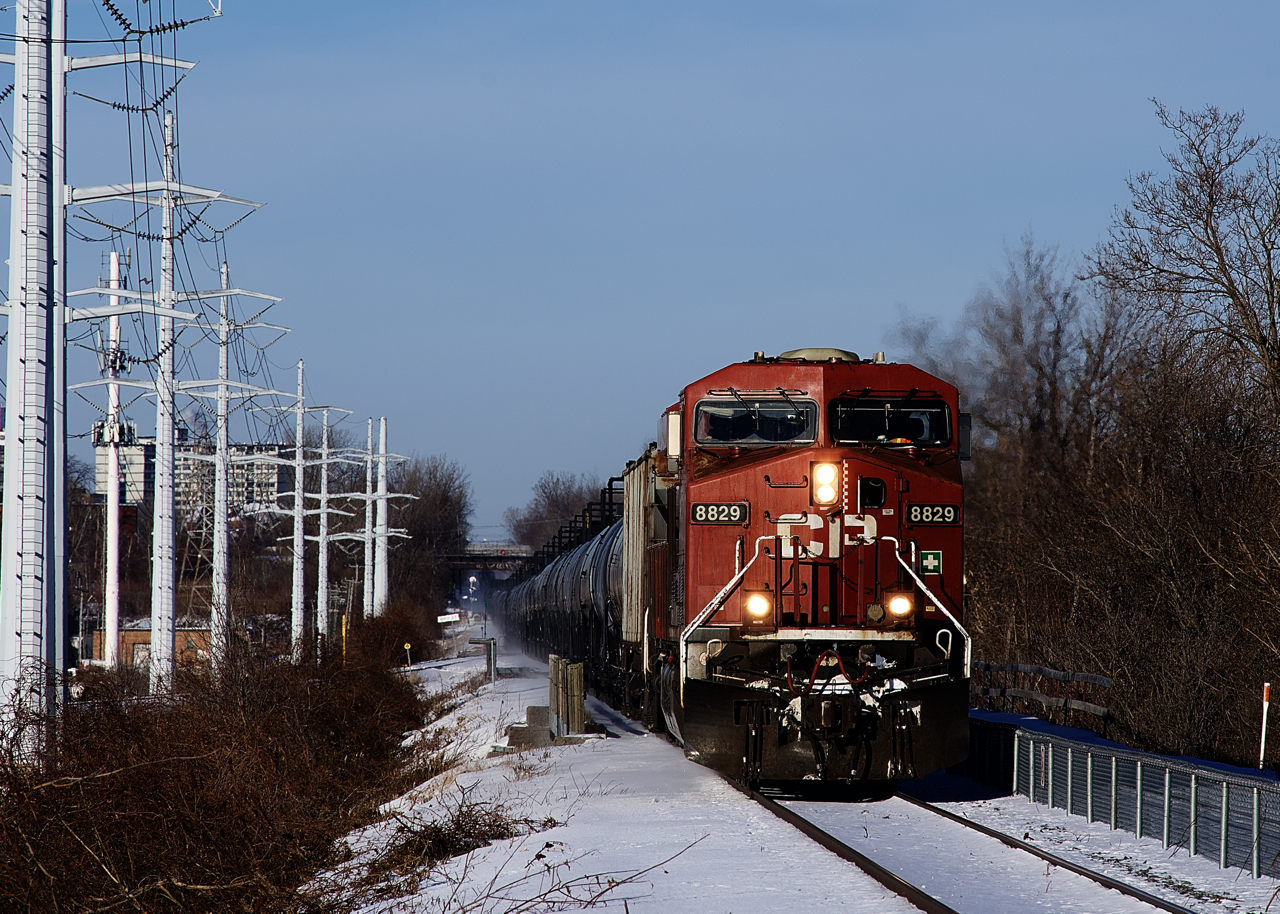 After a quick crew change, loaded ethanol train CP 650 is approaching Du Canal Station with CP 8829 leading.