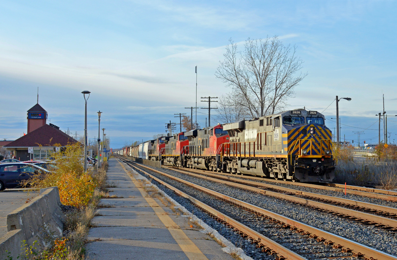 CN M376 rolls past the Dorval VIA Station in Dorval, QC. The train is led by CN ES44AC #3926, an Ex-CitiraiL Leaser formerly numbered CREX 1424 that was bought by CN earlier in 2021.