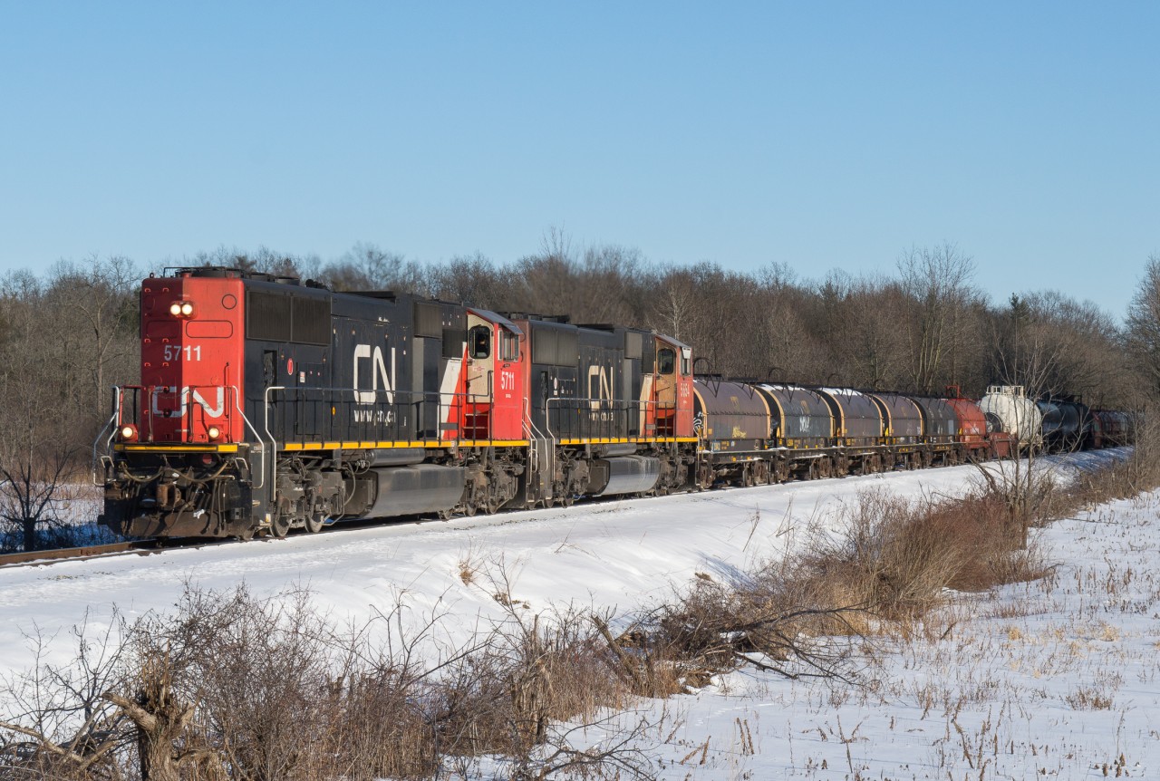 CN L501 approaches Pauline Johnson Road with CN 5711 and CN 5654.  The crew was running at a blistering 15mph and being long hood forward would have made for a very long run to Sarnia.
