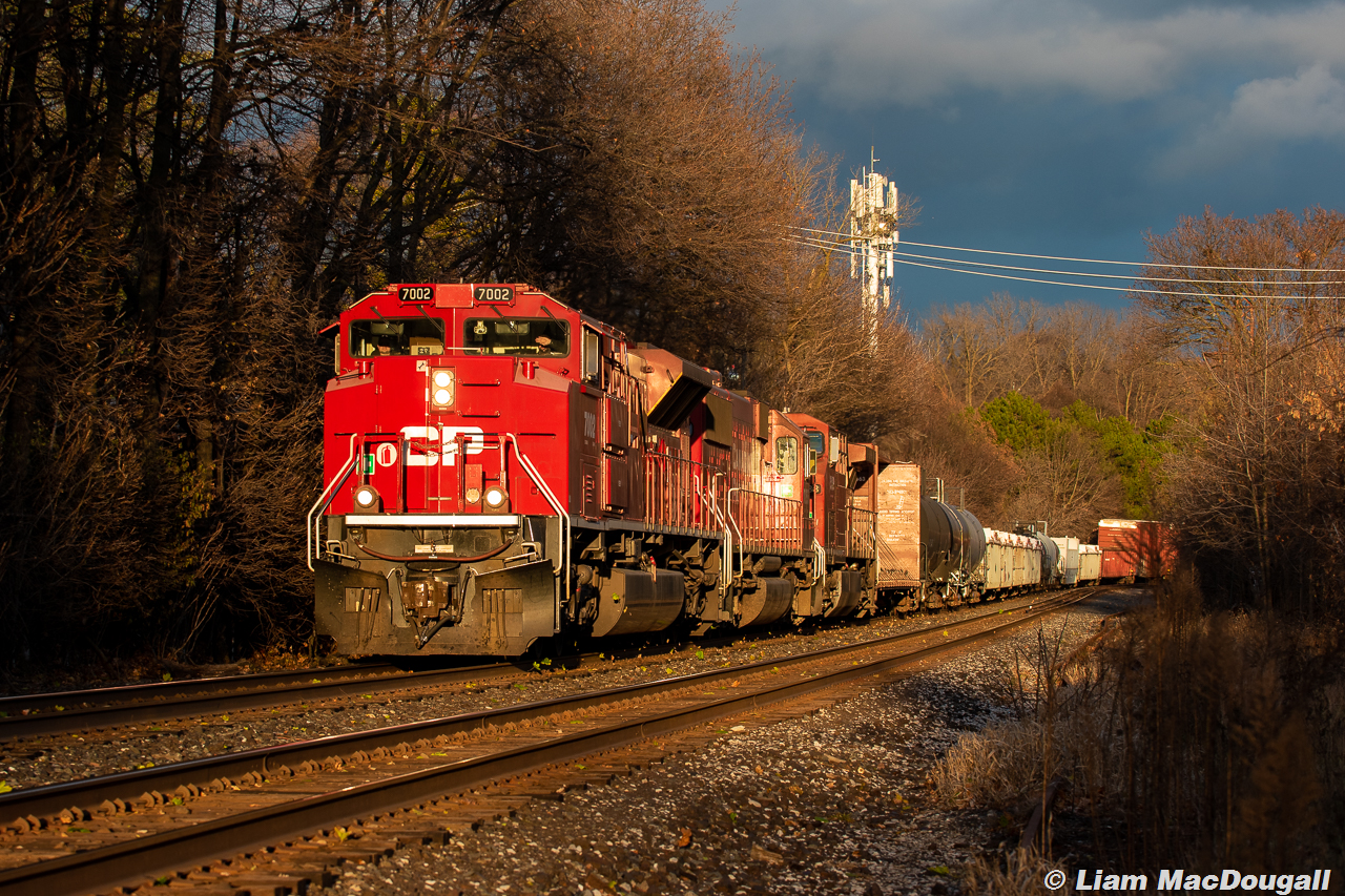 After getting a tip that 421 would be a good set of power this particular afternoon, I set out for it around 2PM to see if I could snag it. For the next 2 hours I waited and waited for it to leave Toronto Yard, and finally it made an appearance with less than an hour left of daylight, completely engulfed in golden hour sun as it passed through Summerhill. The clouds had also been playing games with me the whole time I was out so it was quite satisfying to come out of the situation with a shot like this. Patience pays off!