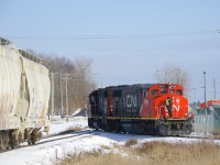 CN 538 is doing switching on two tracks that serve the National Silicates plant as CN 4788 & CN 4700 leaves one of the tracks light power. National Silicates and Goodyear are two busy clients served by CN on the Canadian Industries Limited Spur, which branches off of the Valleyfield Sub at MP 41.2.