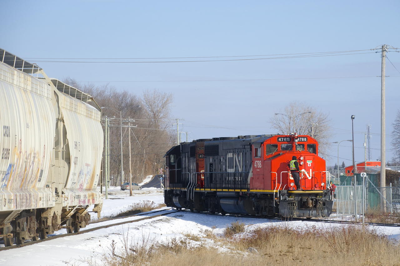 CN 538 is doing switching on two tracks that serve the National Silicates plant as CN 4788 & CN 4700 leaves one of the tracks light power. National Silicates and Goodyear are two busy clients served by CN on the Canadian Industries Limited Spur, which branches off of the Valleyfield Sub at MP 41.2.