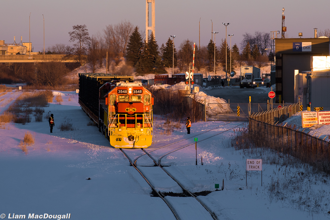 Oshawa Revitalization

QGRY 3548 basks in the remaining sunlight of a chilly January day while the crew prepares to switch out truck frame flatcars at the GM Plant in Oshawa, Ontario. A long, hard fight was needed to keep this plant alive, otherwise GM would’ve pulled out of Oshawa completely and produced all vehicles in Mexico to maximize profits.